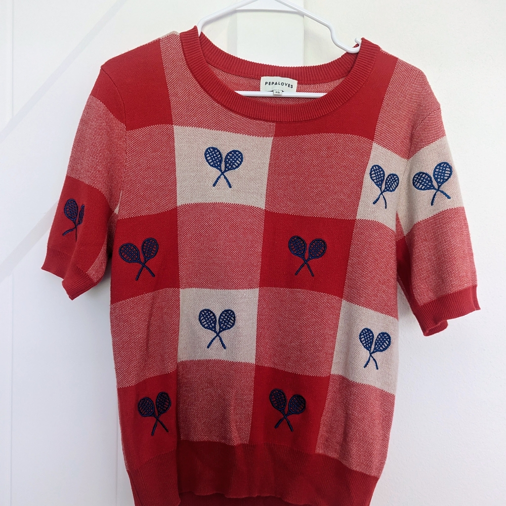 Red and Cream Checkered Sweater with Tennis Racket Design